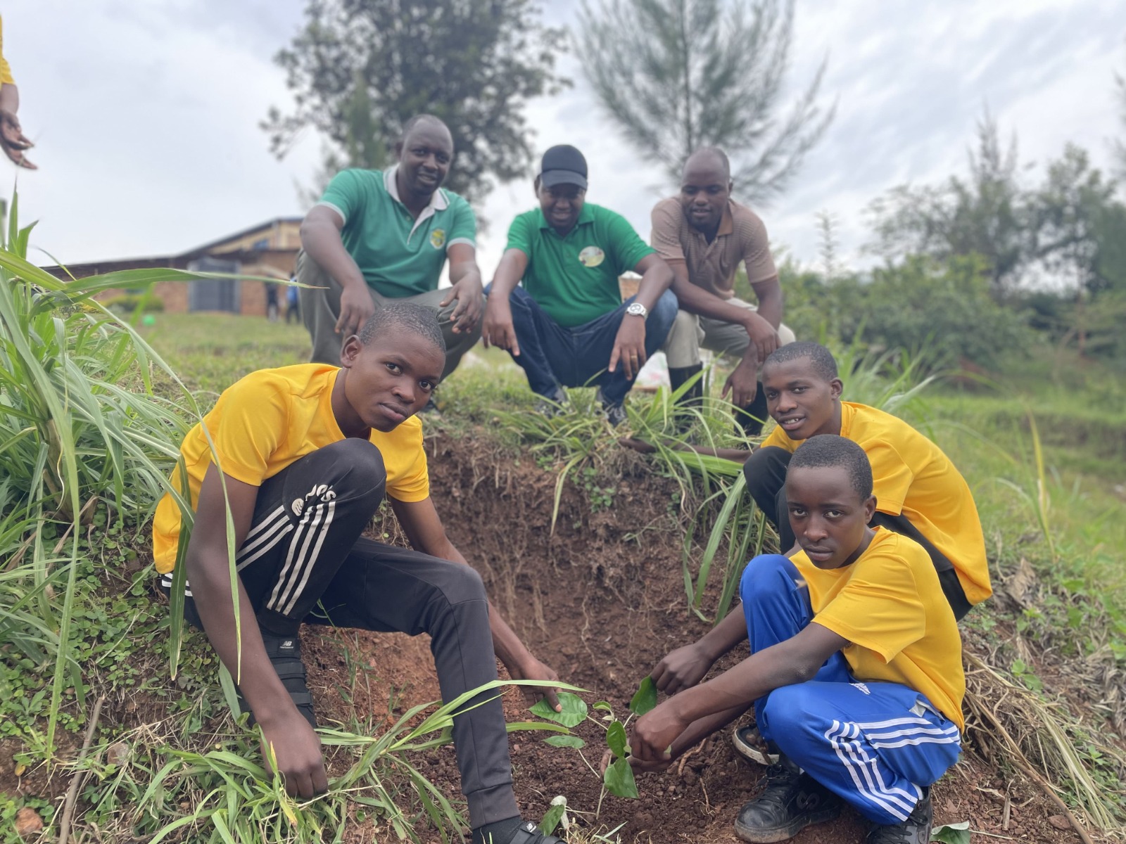 Students from GS Bumbogo planting seedlings as part of environmental club activities.