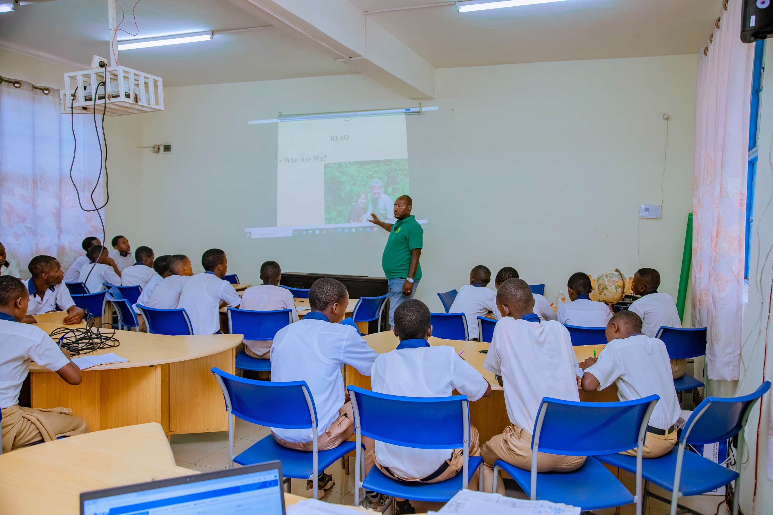 REAO's leader in an environmental awareness and training campaign in secondary school